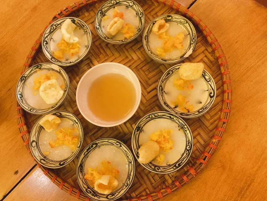 Delicate Bánh bèo water fern cakes served on small ceramic dishes